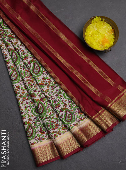 Semi mysore silk saree cream and deep maroon with allover prints and small zari woven border