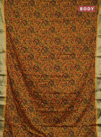 Semi mysore silk saree mustard yellow and green with allover prints and small zari woven border