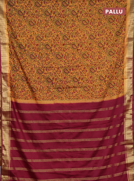 Semi mysore silk saree sandal and deep maroon with allover prints and small zari woven border