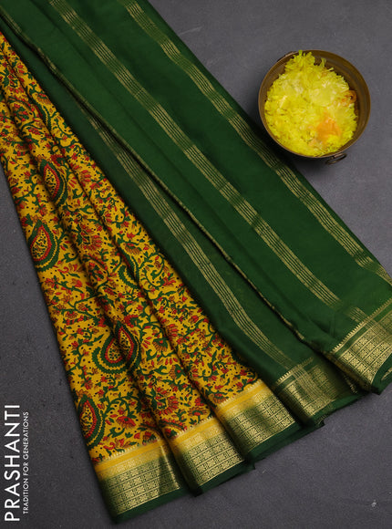 Semi mysore silk saree yellow and green with allover prints and small zari woven border