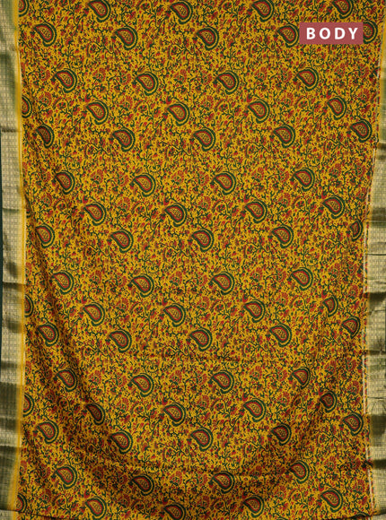 Semi mysore silk saree yellow and green with allover prints and small zari woven border