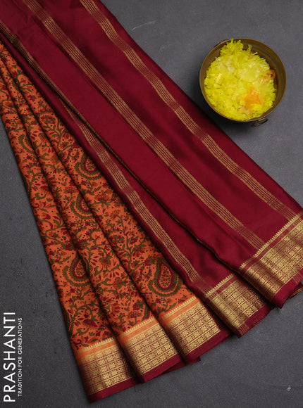 Semi mysore silk saree rust shade and maroon with allover prints and small zari woven border