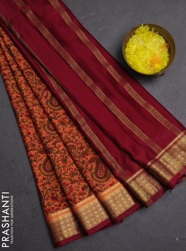 Semi mysore silk saree rust shade and maroon with allover prints and small zari woven border