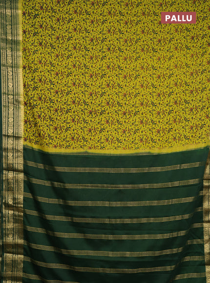 Semi mysore silk saree light green and green with allover prints and zari woven border