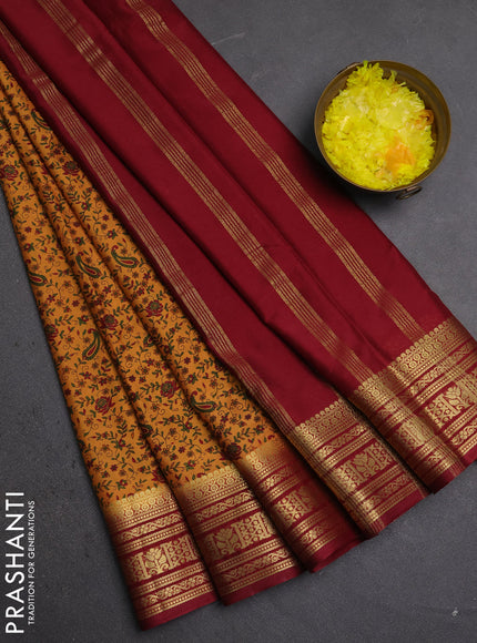 Semi mysore silk saree dark mustard and deep maroon with allover prints and zari woven border