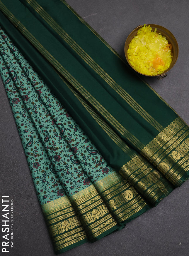 Semi mysore silk saree pastel green and green with allover prints and zari woven border