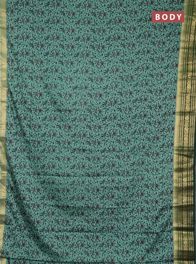 Semi mysore silk saree pastel green and green with allover prints and zari woven border