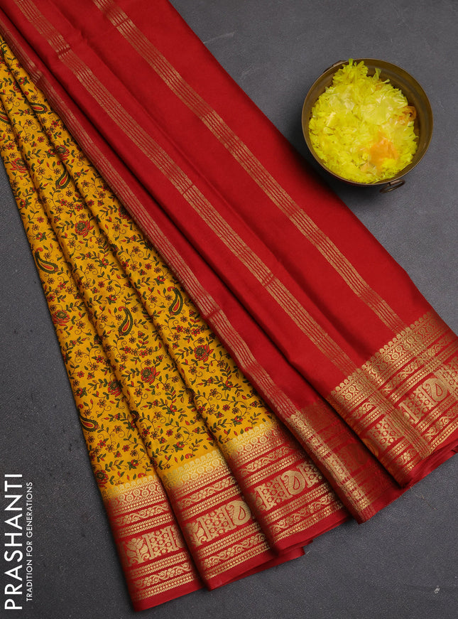Semi mysore silk saree yellow and red with allover prints and zari woven border