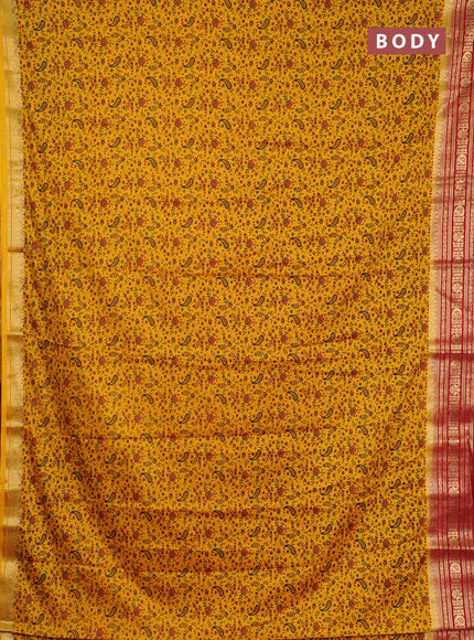 Semi mysore silk saree yellow and red with allover prints and zari woven border
