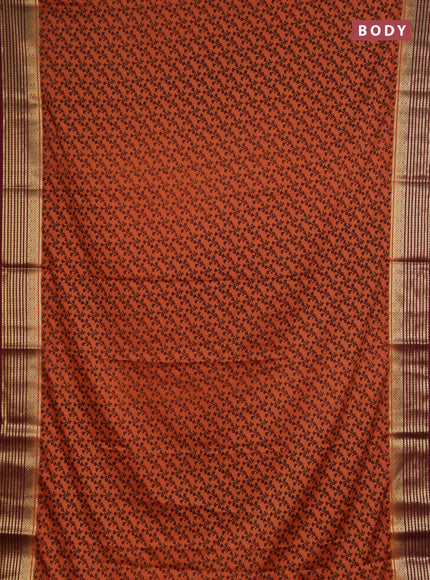 Semi mysore silk saree orange and deep maroon with allover floral prints and zari woven border