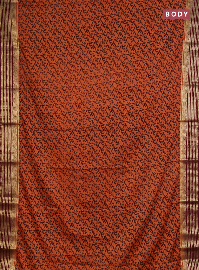 Semi mysore silk saree orange and deep maroon with allover floral prints and zari woven border