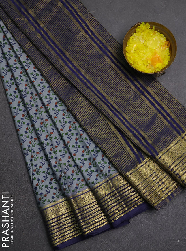 Semi mysore silk saree grey and navy blue with allover floral prints and zari woven border