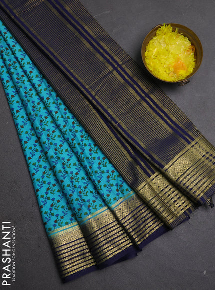 Semi mysore silk saree teal blue and navy blue with allover floral prints and zari woven border