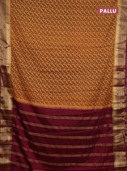 Semi mysore silk saree sandal and deep maroon with allover floral prints and zari woven border