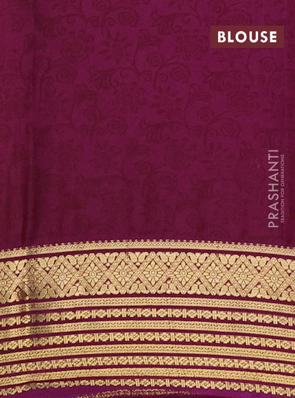 Semi mysore silk saree peach shade and purple with allover floral prints and zari woven border