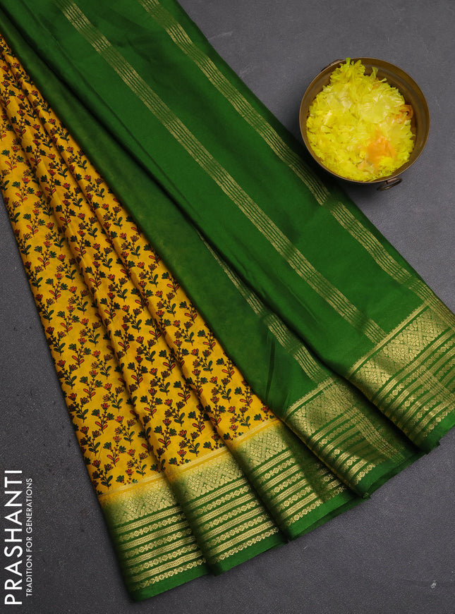 Semi mysore silk saree mustard yellow and green with allover floral prints and zari woven border