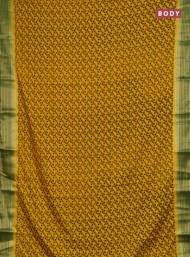 Semi mysore silk saree mustard yellow and green with allover floral prints and zari woven border