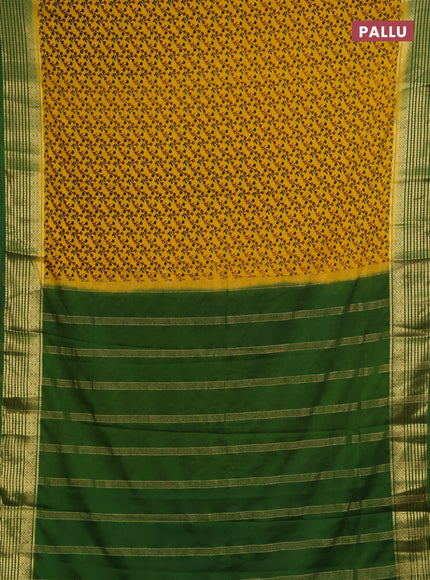Semi mysore silk saree mustard yellow and green with allover floral prints and zari woven border