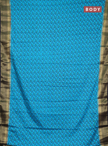 Semi mysore silk saree teal blue and jamun shade with allover floral prints and zari woven border