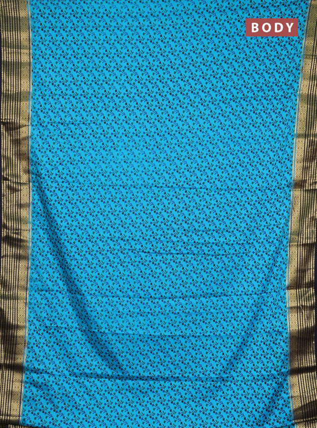 Semi mysore silk saree teal blue and jamun shade with allover floral prints and zari woven border