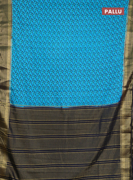 Semi mysore silk saree teal blue and jamun shade with allover floral prints and zari woven border