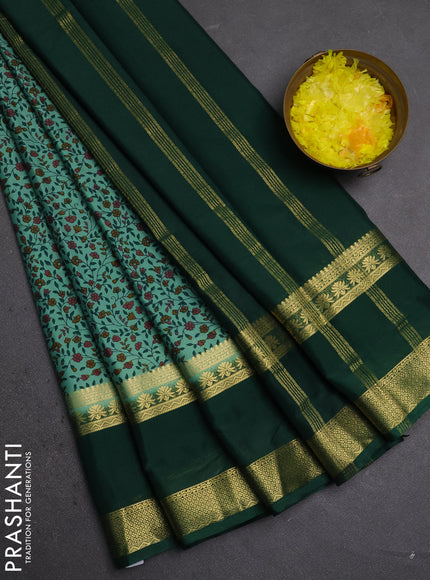 Semi mysore silk saree pastel green and green with allover floral prints and rettapet zari woven border
