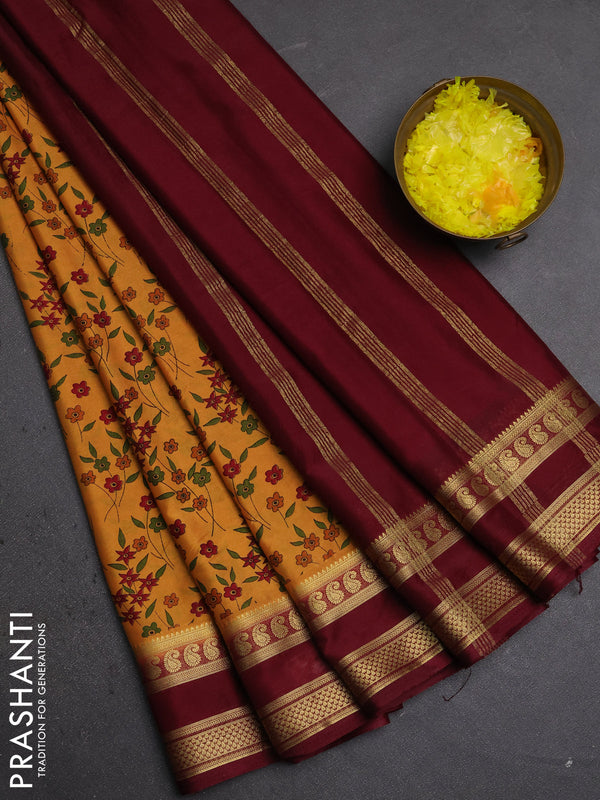 Semi mysore silk saree mustard yellow and deep maroon with allover floral prints and rettapet zari woven border
