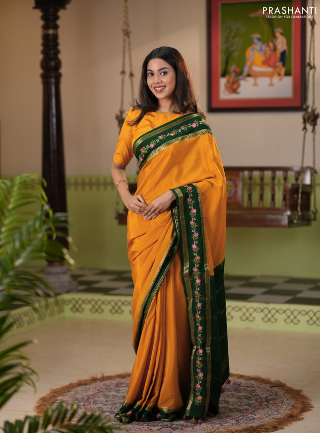Pure mysore silk saree dark mustard and green with plain body and rettapet zari woven embroidery border
