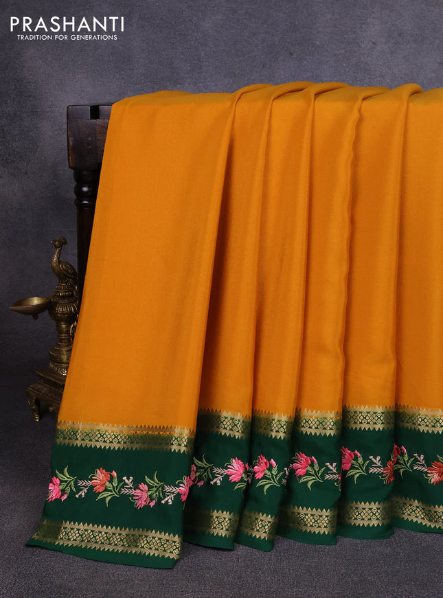 Pure mysore silk saree dark mustard and green with plain body and rettapet zari woven embroidery border