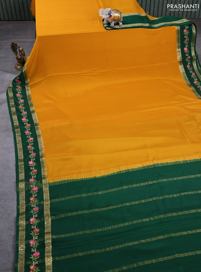 Pure mysore silk saree dark mustard and green with plain body and rettapet zari woven embroidery border