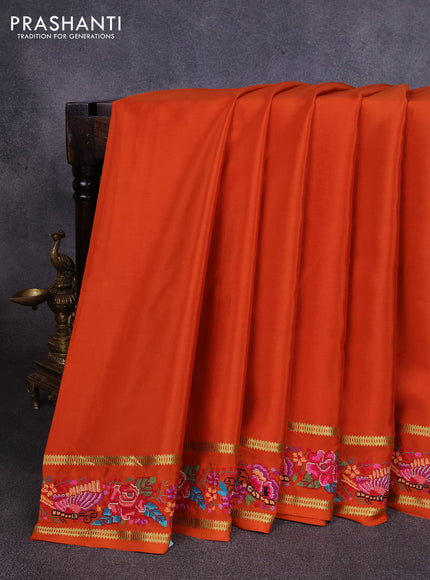 Pure mysore silk saree rust shade with plain body and rettapet zari woven embroidery border