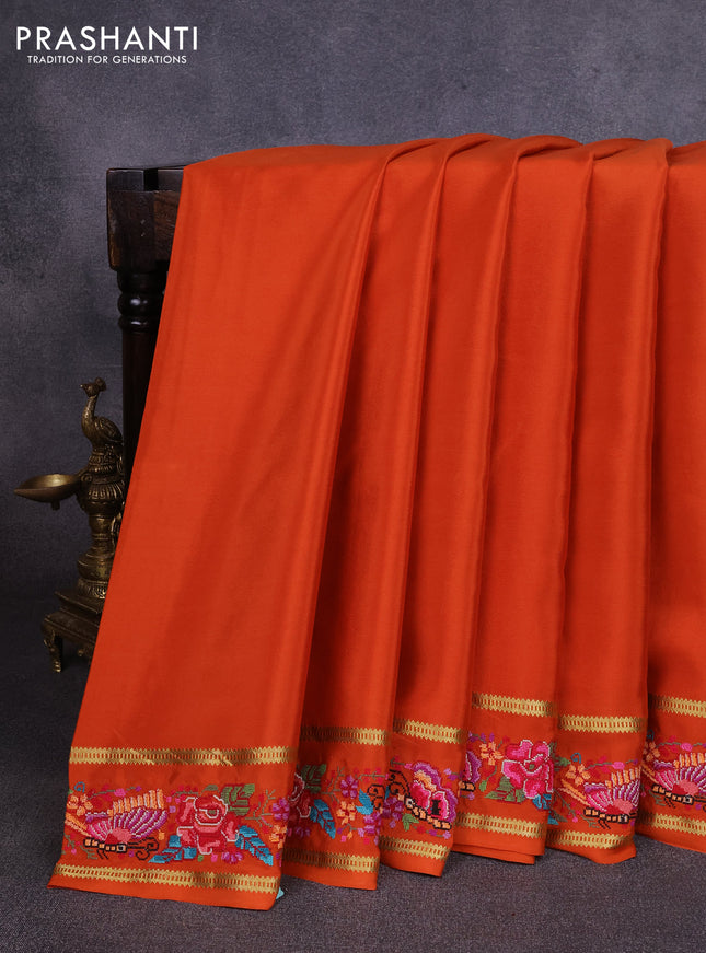 Pure mysore silk saree rust shade with plain body and rettapet zari woven embroidery border