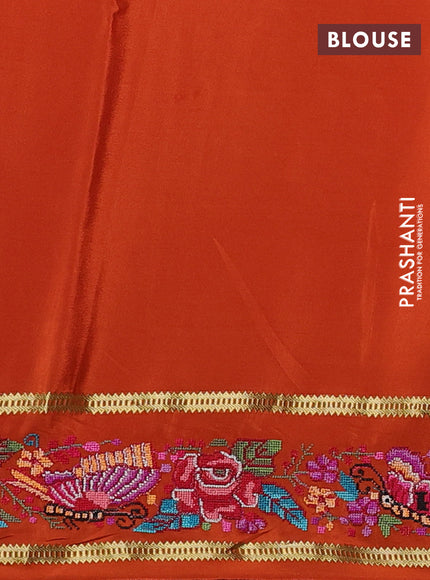 Pure mysore silk saree rust shade with plain body and rettapet zari woven embroidery border