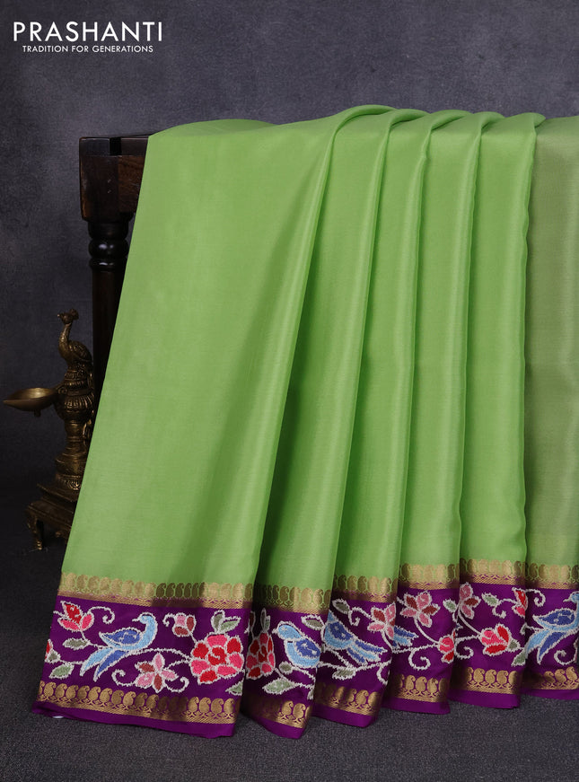 Pure mysore silk saree pista green and purple with plain body and rettapet zari woven embroidery border