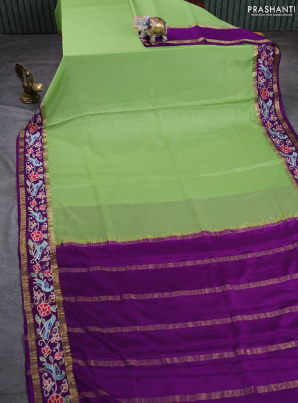 Pure mysore silk saree pista green and purple with plain body and rettapet zari woven embroidery border