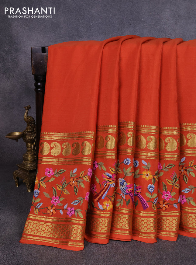 Pure mysore silk saree rust shade with plain body and long rettapet zari woven embroidery border