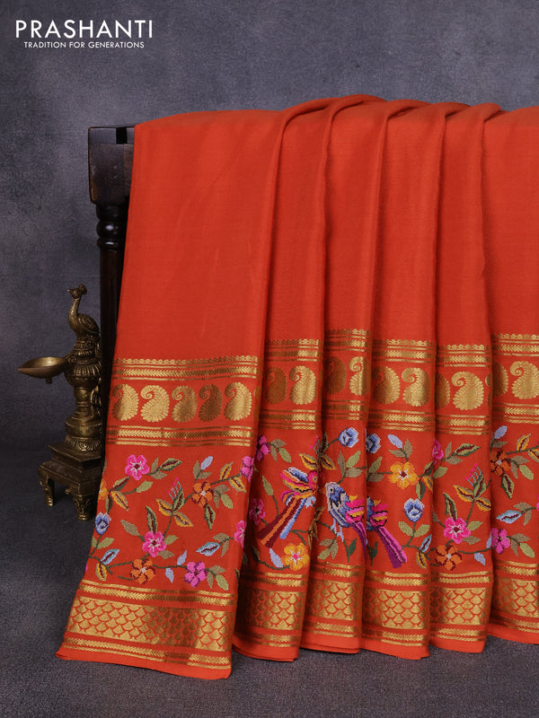 Pure mysore silk saree rust shade with plain body and long rettapet zari woven embroidery border