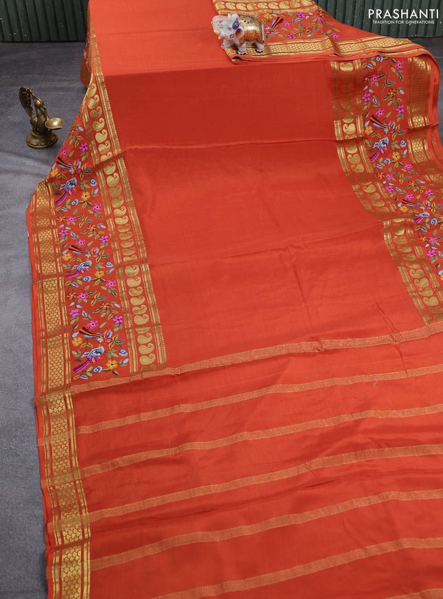 Pure mysore silk saree rust shade with plain body and long rettapet zari woven embroidery border