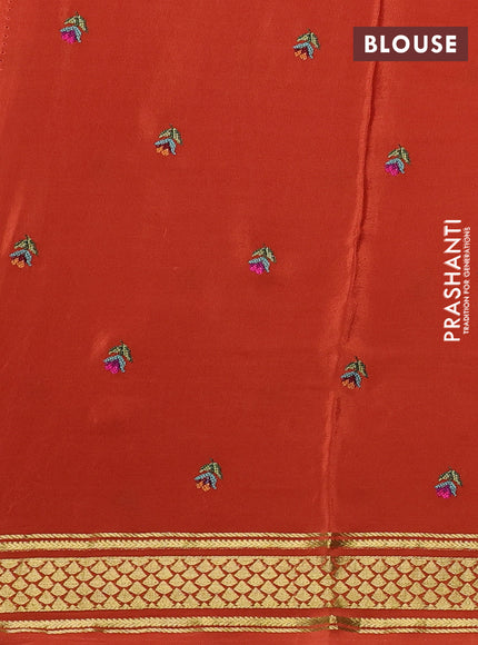 Pure mysore silk saree rust shade with plain body and long rettapet zari woven embroidery border