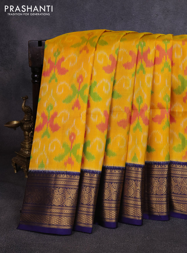 Ikat soft silk saree yellow and navy blue with allover ikat weaves and zari woven border