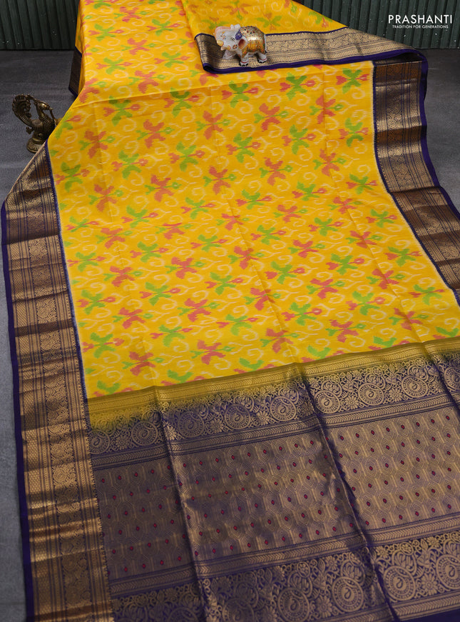 Ikat soft silk saree yellow and navy blue with allover ikat weaves and zari woven border