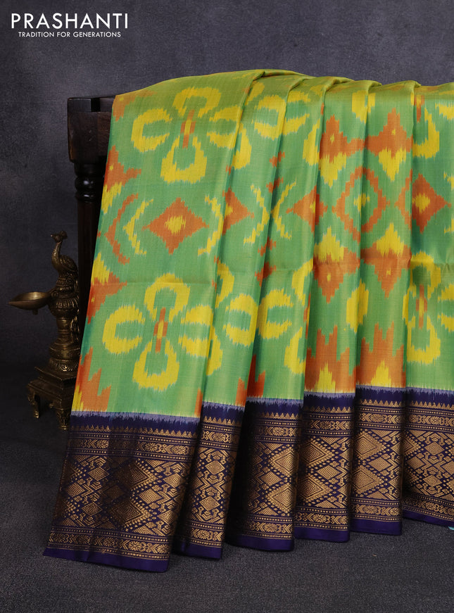 Ikat soft silk saree dual shade of teal green and navy blue with allover ikat weaves and zari woven border