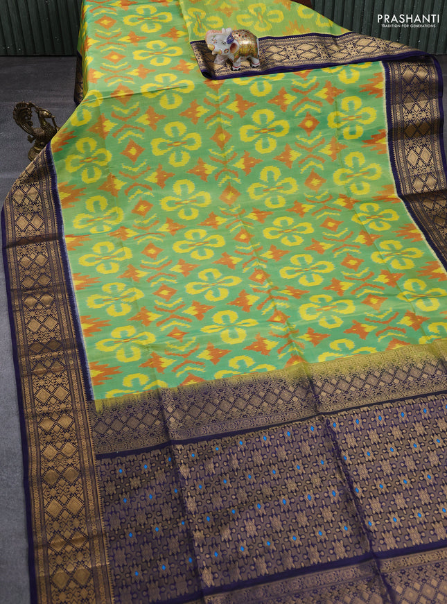 Ikat soft silk saree dual shade of teal green and navy blue with allover ikat weaves and zari woven border
