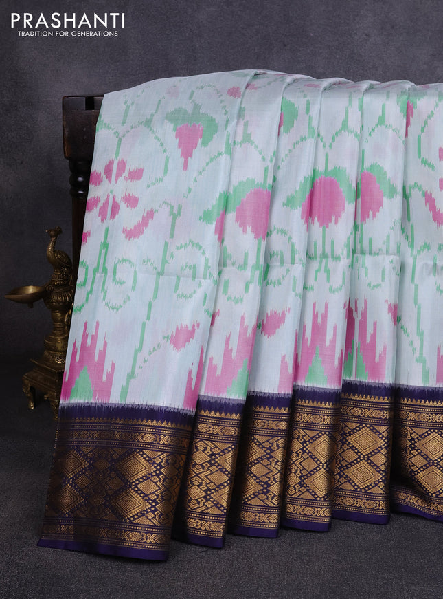 Ikat soft silk saree cream green and navy blue with allover ikat weaves and zari woven border