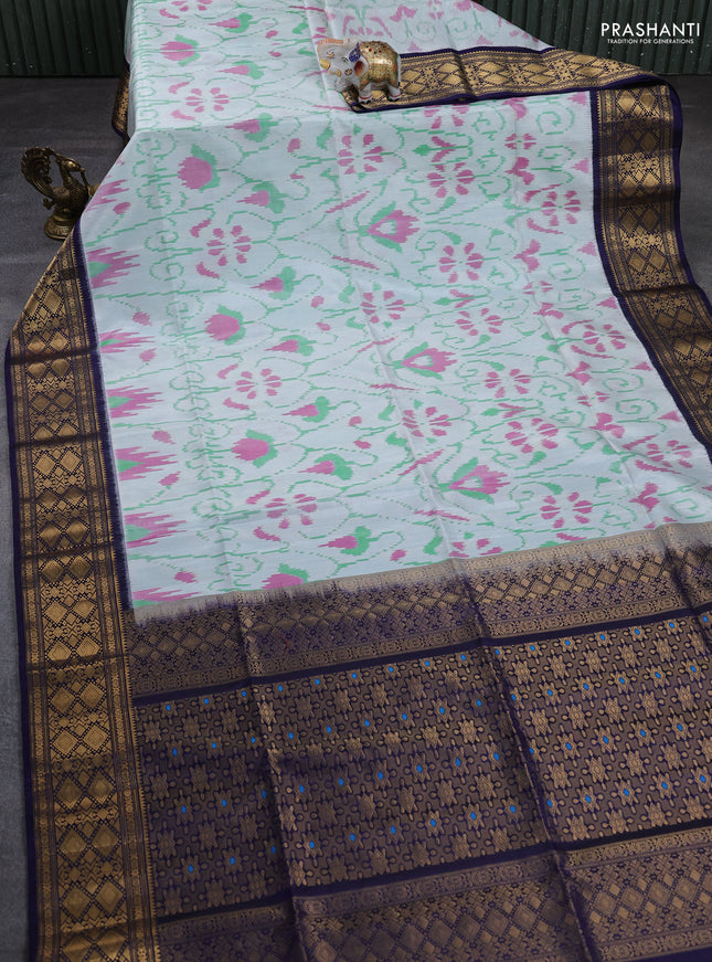 Ikat soft silk saree cream green and navy blue with allover ikat weaves and zari woven border