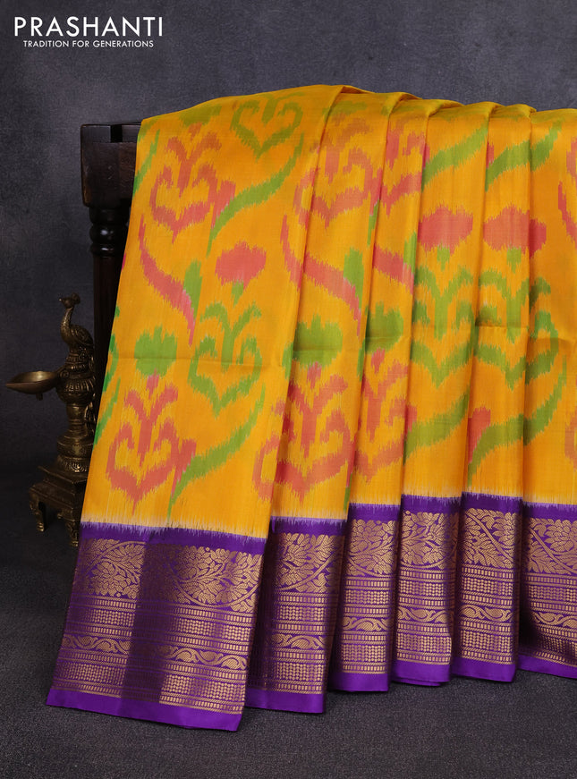 Ikat soft silk saree mango yellow and purple with allover ikat weaves and zari woven border