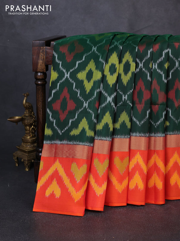 Ikat soft silk saree bottle green and orange with allover ikat weaves and zari woven ikat border