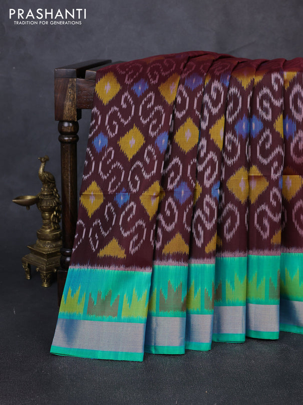 Ikat soft silk saree coffee brown and teal green with allover ikat weaves and ikat zari woven border
