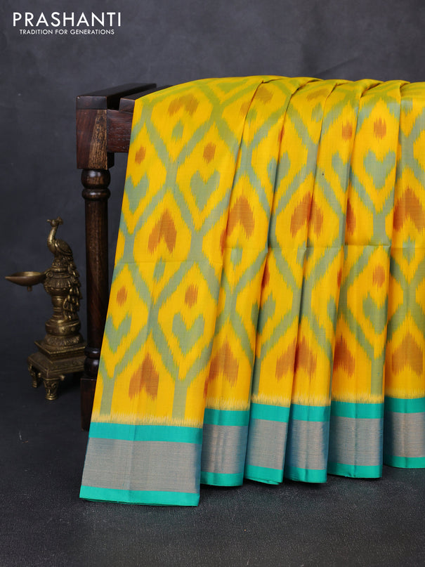 Ikat soft silk saree yellow and light blue with allover ikat weaves and zari woven border