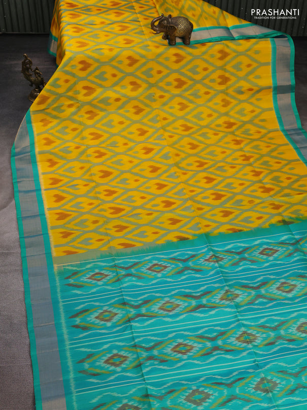 Ikat soft silk saree yellow and light blue with allover ikat weaves and zari woven border